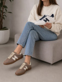 Brown suede Tommy Hilfiger casual sneakers featuring signature H side logo and gum sole for women